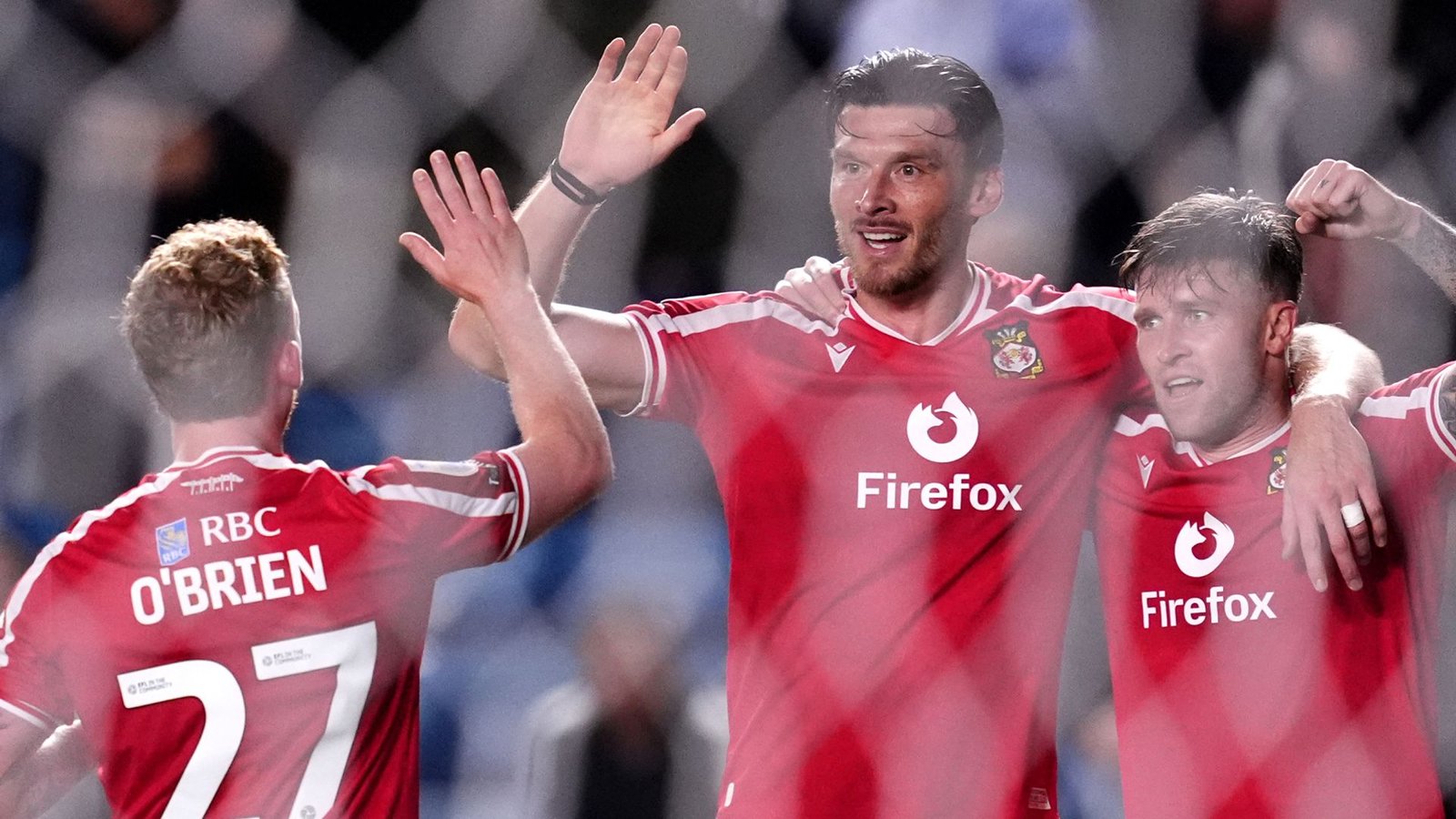 Wrexham Secures First Championship Win with 3-0 Victory Over Millwall