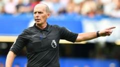 Mike Dean Reflects on His Unique Approach to Premier League Refereeing